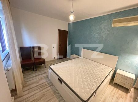 Apartament 3 camere 2 bai 78mp, centrala termica, 2x aer conditionat, zona Patria - Photo 2
