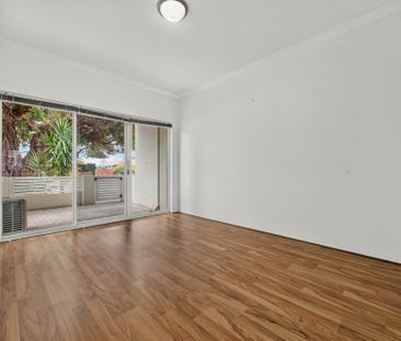 Modern Two-Bedroom Unit with Courtyard! - Photo 1
