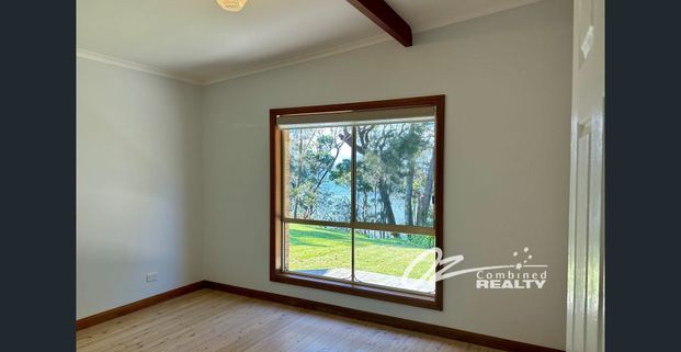 Stunning Waterfront 3-Bedroom Home - Photo 1