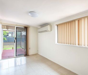 Tidy Two Bedroom Home in Convenient Location - Photo 3