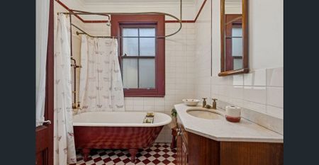 Charming Tri-Level Newtown Home with Period Features & Parking - Photo 2