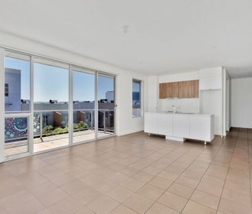 Top Floor 3 Bedroom Apartment in Mawson Central - Photo 6