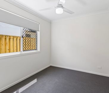 LOW MAINTENANCE AND MODERN 2 BEDROOM HOME WITH AIR CON AVAILABLE SOON! - Photo 2