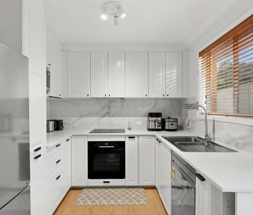 MODERN & LOW MAINTENANCE! - Photo 1