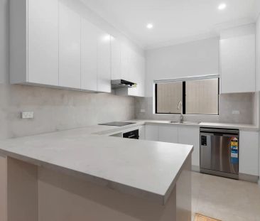 “Fully Renovated Family Home with Expansive Parking & Yard” - Photo 4