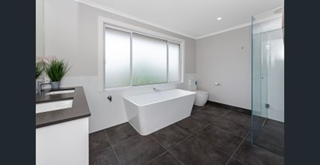 Family home located in the McKinnon School Zone! - Photo 5