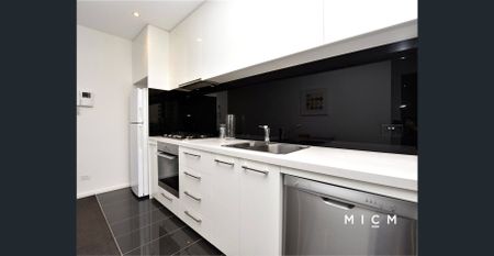 "EPIC" Lifestyle Awaits - Two Bedroom Luxury With Bay Views! - Photo 4
