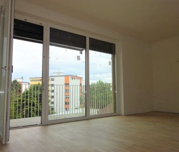 Schöne, helle 3-Zimmer-Wohnung mit Balkon und KFZ-Tiefgaragenabstel... - Photo 2