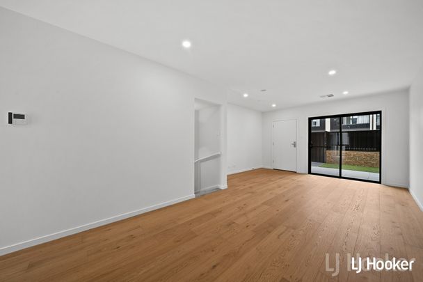 Stylish Split Level 2 Bedroom Home with Triple Garage - Photo 1