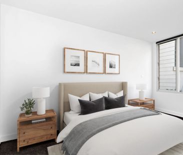 Modern Two-Bedroom Townhouse with Balcony and Secure Garage - Photo 2