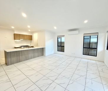 Modern 4-Bedroom Family Home in Convenient Pallara Location - Photo 2