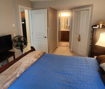 Big, Ground Floor 1 bed + den at Waterscapes - Photo 1