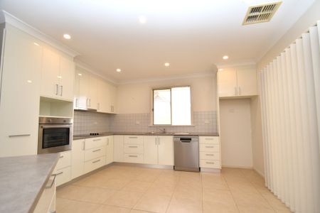 Three Bedroom - North Location - Photo 4