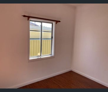 Neat, Bright & Convenient Two-Bedroom Home - Photo 1