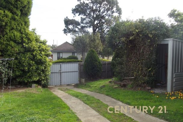 Spacious 3-Bedroom Home on a Large Corner Block - Photo 1