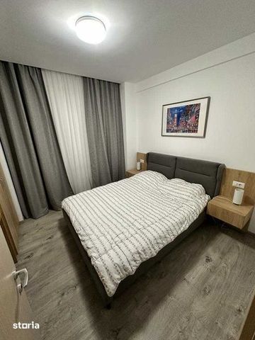 Inchiriez ap. 2 camere central cu loc parcare - Fotografie 2