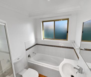 Spacious & Stylish 4-Bedroom Family Home - Photo 1