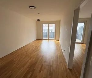 Ab 1.10. - Helle, moderne 2-Zimmerwohnung mit südseitigem ca. 11,5m² Balkon am Genochplatz - Foto 1