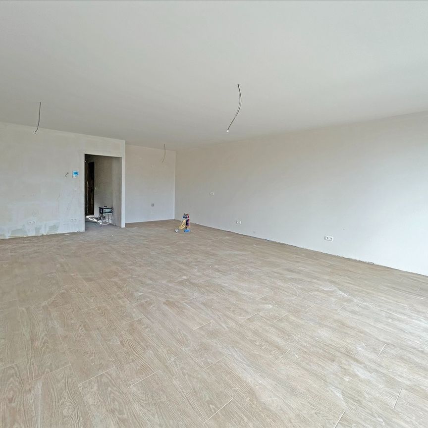 Nieuw 2 slaapkamer appartement met ruim terras in het centrum van Schoten! - Foto 1