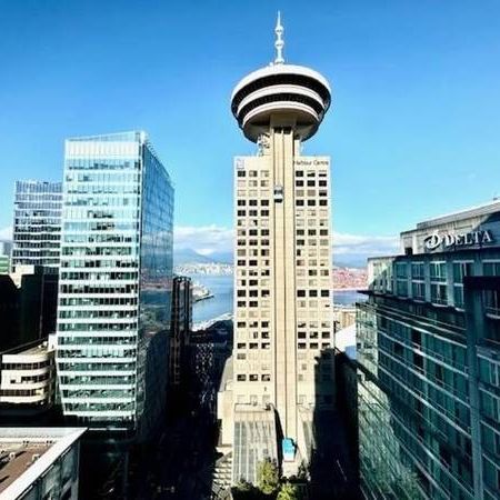 Furnished Stylish & Modern 1-Bdrm+ Den with Stunning Views! - Photo 1