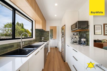 Elevated Coastal Living with Panoramic Harbour Views - Photo 5