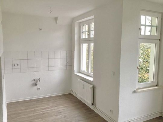 Dachgeschosswohnung mit Charme - Foto 1