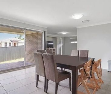 Four Bedroom House with Ducted AC! - Photo 2