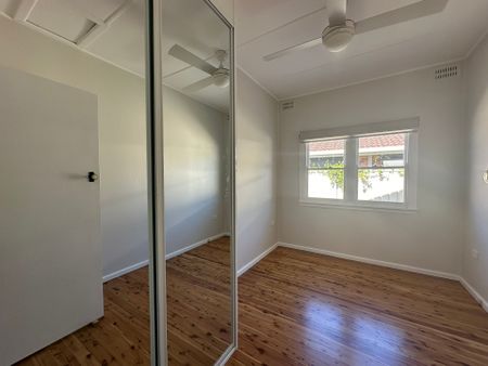 Coastal Charm Meets Modern Comfort - Photo 2