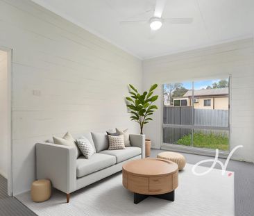 UPDATED FAMILY HOME WITH LARGE YARD AND ALFRESCO AREA - Photo 1