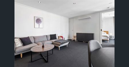 Stylish Furnished One-Bedroom Apartment in the Heart of the City - Photo 2