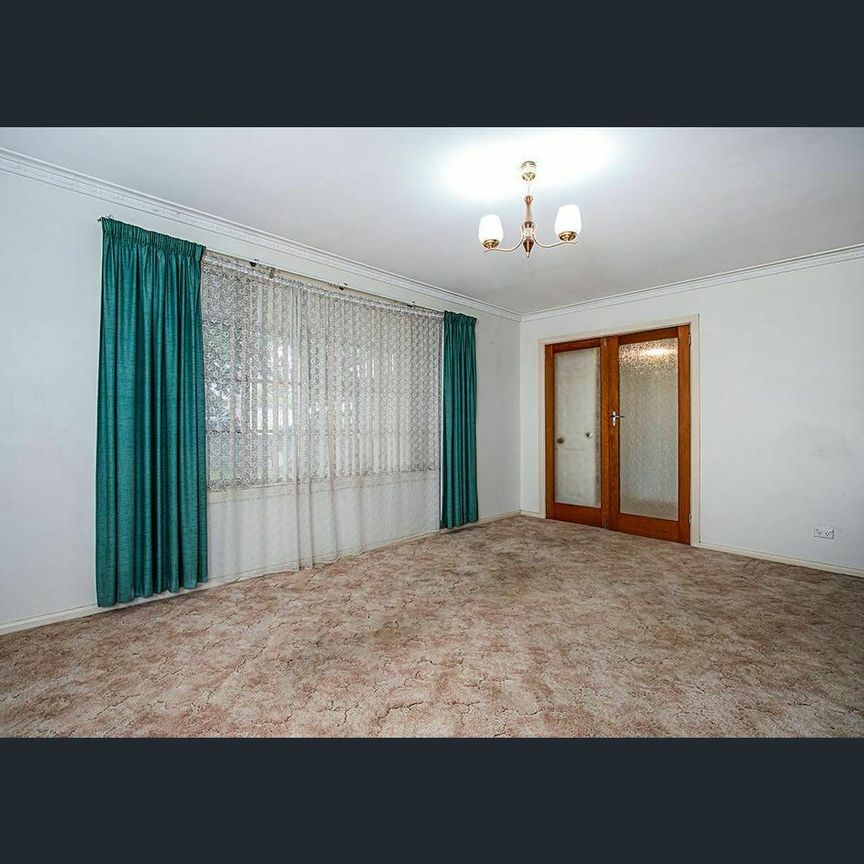 Conveniently Located Family Home - Photo 1