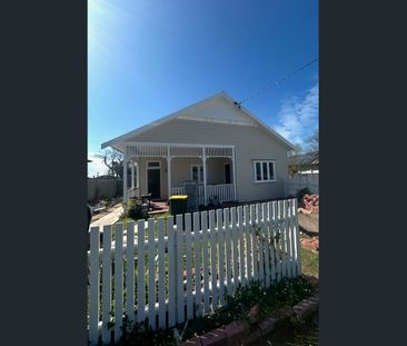 1920's Charisma with Lawn Maintenance Included! - Photo 3