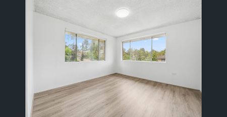 BRIGHT TOP FLOOR FULLY RENOVATED UNIT - Photo 2