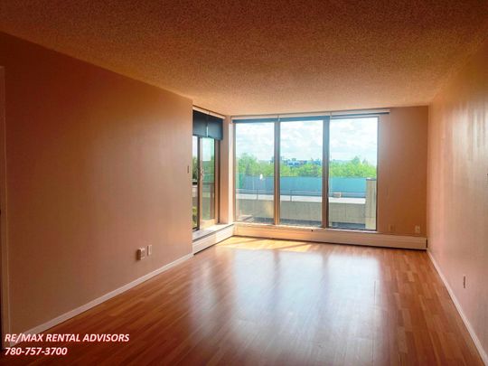 GREAT 2 BED, 2 BATH, 5TH FLOOR APARTMENT WITH A COVERED PARKING STALL IN THE COMMUNITY OF STRATHCONA - Photo 1
