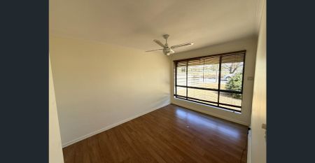 Spacious 3-Bedroom Home with Huge Yard & Verandah - Photo 3