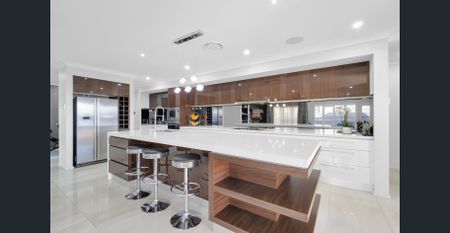Family Home In Oran Park - Photo 5