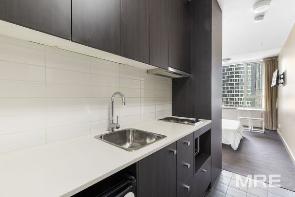 1207/43 Therry Street, Melbourne - Photo 1
