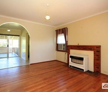 Charming 3 Bedroom Home with Large Entertaining Deck - Photo 4