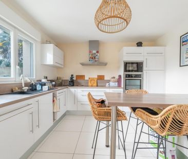 Location Maison 7 pièces 120m² TREILLIERES 44119 - Photo 6