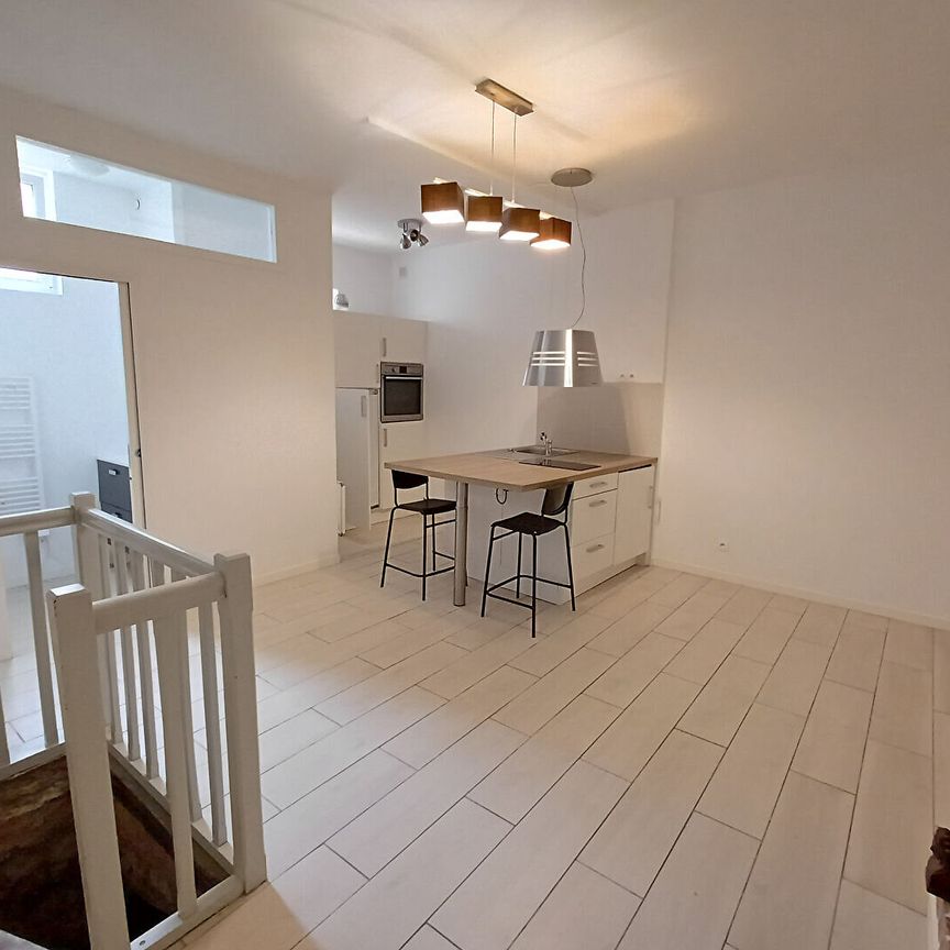 T1 de 26.25m² en Hyper-Centre , Pièce voûtée en souplex - Photo 1