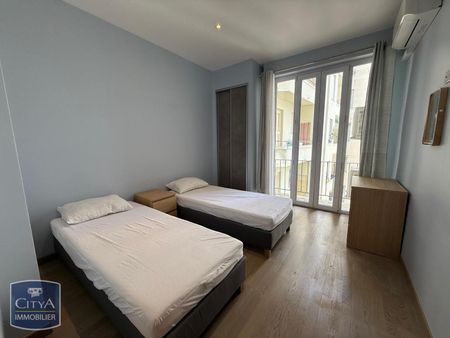 Location Appartement 4 pièces 94m² NICE 06000 - Photo 5