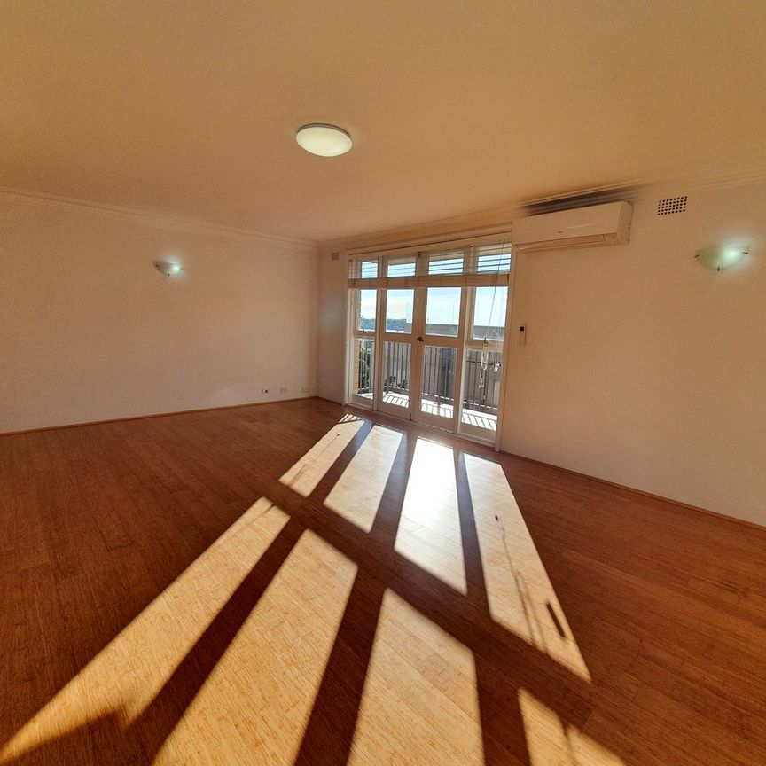 RENOVATED APARTMENT WITH LOVELY WATERVIEWS AND GARAGE - Photo 1