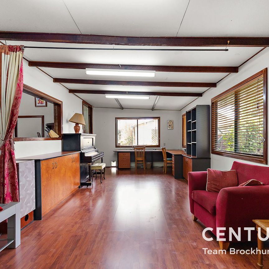 Charming 1950s Home with Modern Flexibility & Pristine Gardens! - Photo 1