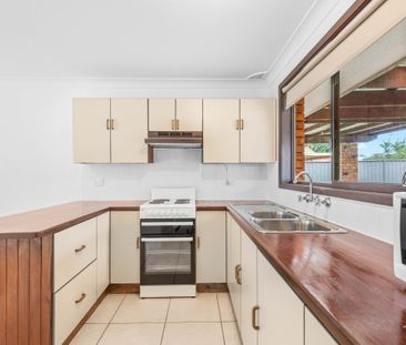 Neat & Tidy home with great size yard - Photo 6