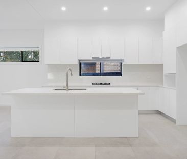 Near new, spacious four bedroom duplex backing onto a reserve - Photo 6