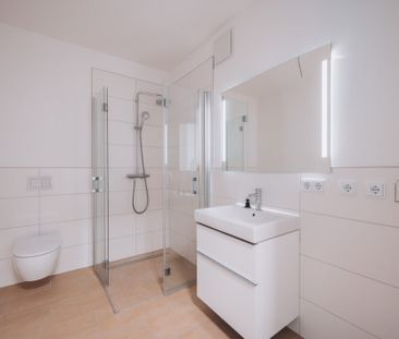 Neubaukomfort: Stilvolle 1-Zimmer-Wohnung mit Einbauküche und Balkon - Photo 6