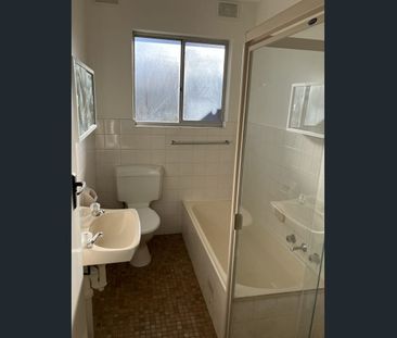 Two bedroom unit with secure garage and air conditioning - Photo 4