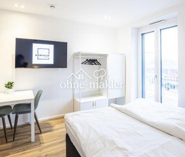 Neubauapartment mit Balkon. Super Anbindung. - Foto 1