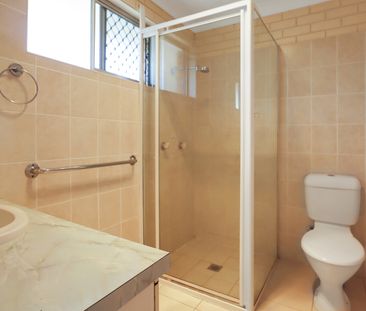 Light-Filled Coastal Unit in Convenient Location - Photo 3
