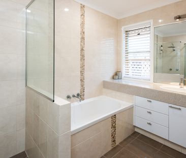 FAMILY HOME OFFERING SPACE, COMFORT AND AN EXCEPTIONAL LIFESTYLE LO... - Photo 6